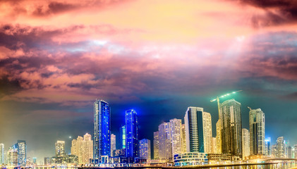 Dubai Marina skyscrapers reflections at sunset, UAE