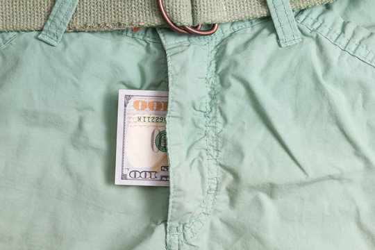 hundred dollar bill inside  codpiece green pants