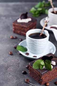 chocolate cake with a cup of coffee
