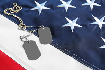 Army tokens on American national flag background