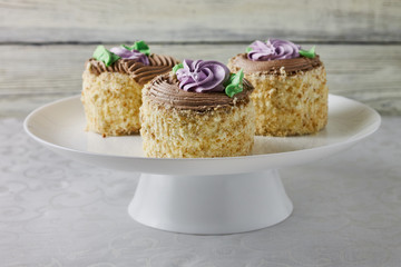 Homemade cake dessert with cream on a white background