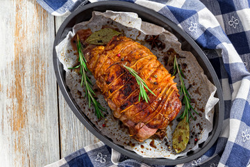 delicious turkey meat roulade grilled  in roasting dish