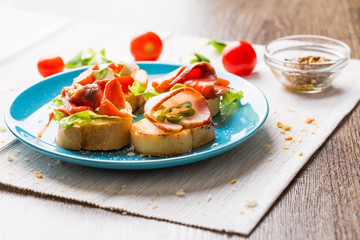 Bruschetta with salmon and bacon