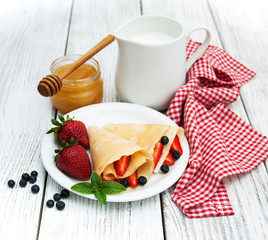 crepes with strawberries and blueberries