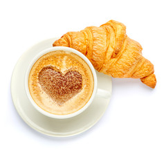 coffee and croissant on a white background