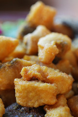 close-up Fried Fish nuggets decorated with herb
