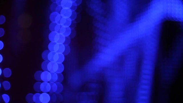 Universe colorful moving bokeh unfocused lights in club