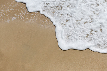 Waves breaking on the beach