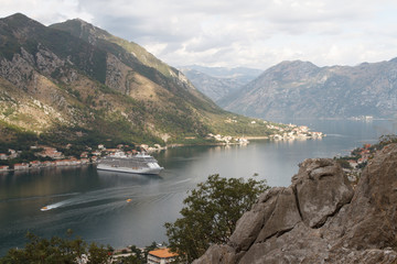 Nice view of the mountains and a cruise ship in the Bay of Kotor. Montenegro