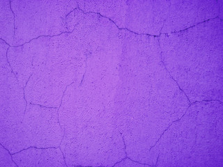 Purple grunge paint wall background or texture