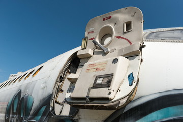Airplane wreckage white passenger door