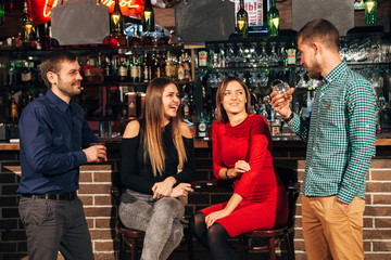 women laugh at the jokes  the bar