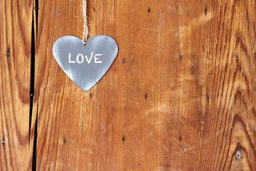heart with love on wooden background with copy space