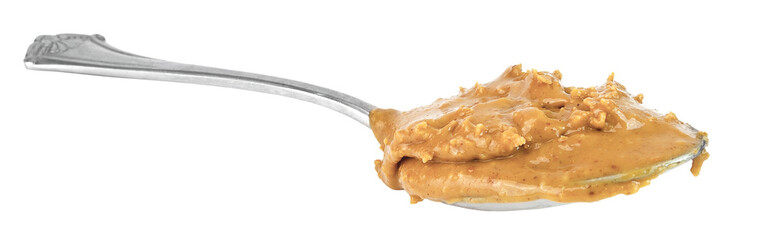 Isolated spoonful of peanut butter. Horizontal.