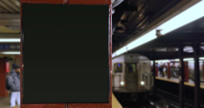 A New York City subway car approaches an underground platform with a blank ID sign for customization. Audio included.	