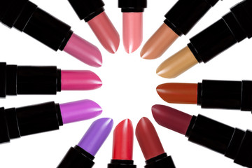 Obraz premium Set of color lipsticks forming a circle. Lipstick set isolated o