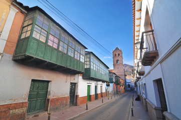 Street View of the Bolivian city Potosi at sunrise - obrazy, fototapety, plakaty