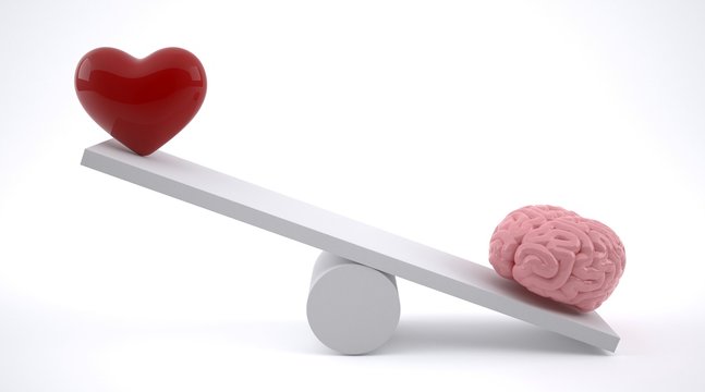 Brain and heart on a balance scale.