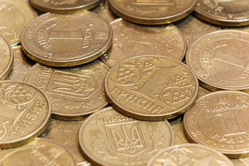 Side closeup of Ukrainian metallic coins hrivnya