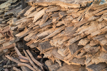 A pile of different shape and size of firewood, wood pile, wood