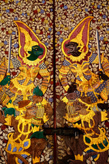 Bangkok, Thailand - March 20 ,2016 Public painting Thailand art ramayana literature on the door in the temple " Wat Suthat "
