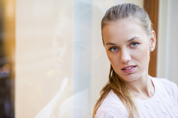 Obraz premium Portrait close up of young beautiful woman