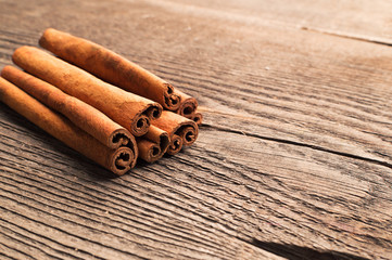 Some cinnamon sticks on the wooden table
