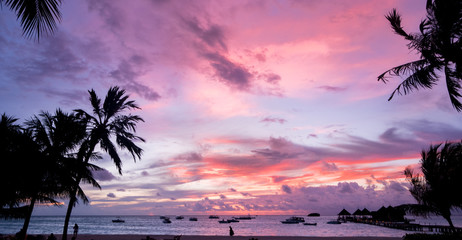 Sunset on the beach with beautiful sky background.