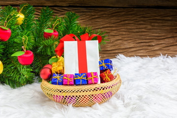 Gift box and Christmas tree ornaments