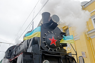 Restored steam locomotive Er-794-12 near the platform of railway station