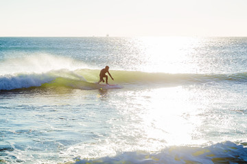 Surfing in the winter, and ocean wave
