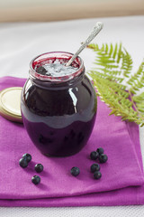 Bilberry confiture in a glass jar