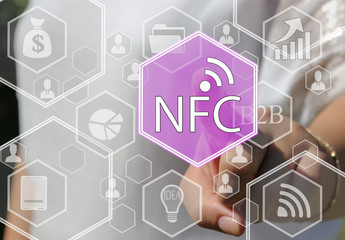 The businesswoman clicks on the NFC  icon on the touch screen the web network .  
