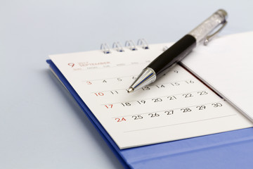 Planning calendar on the office desk.