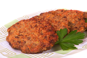 fried liver cutlets or pancakes on a plate isolated  white background