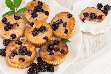 blackberry muffins on a plate