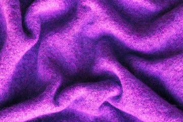 Fototapeta na wymiar Close Up Of Pink And Purple Crumpled Woolen Cloth. Top View. Woolen Cloth.