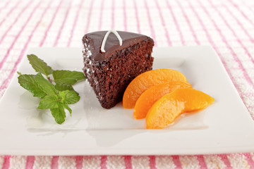 Chocolate cake with peach slices