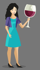 happy cute brunette girl with a cup full of wine