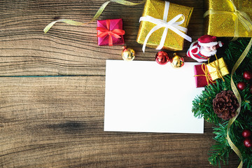 Christmas gift boxes on wooden table with place for copy space