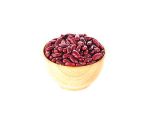 Red beans in a wooden bowl on a white background