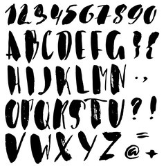 Hand drawn font made by dry brush strokes. Grunge style alphabet