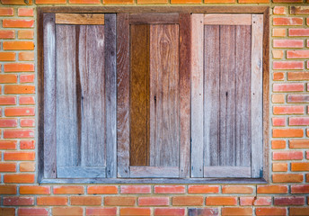 old vintage brick wall and wooden window