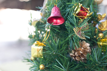 Gift boxes and ornaments in Merry Christmas and Happy New Year concept with bokeh background, can be use for make a greeting cards.