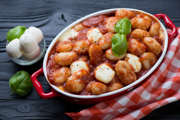 Casserole with italian gnocchi alla Sorrentina, close-up
