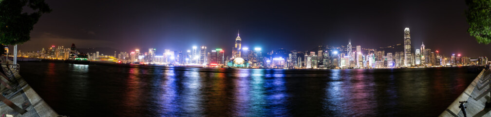 Fototapeta na wymiar Hong Kong, China skyline panorama from across Victoria Harbor.