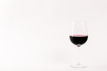red wine glass on white background