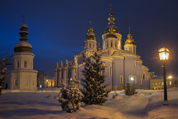 Fototapeta na wymiar Illuminated churches of St. Michael's Golden-Domed Monastery