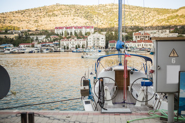 White motor boat in marina of Balaklava city