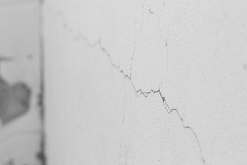 Fototapeta premium Detail of white crack wall